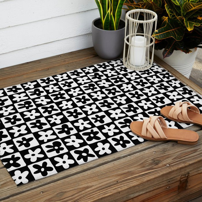 Black and white checkered floral pattern art Outdoor Rug Gallery Image 2