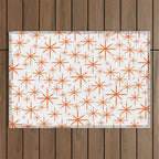 Twinkling Starbursts Mid Century Modern Pattern in White and Orange Outdoor Rug Gallery Image 1