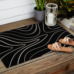 Minimalist Topographical Abstract in Black and Almond Cream Outdoor Rug Gallery Image 2