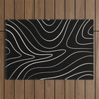 Minimalist Topographical Abstract in Black and Almond Cream Outdoor Rug Gallery Image 1