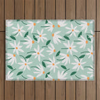 Drifting Daisies #2 - green tangerine Outdoor Rug Gallery Image 1