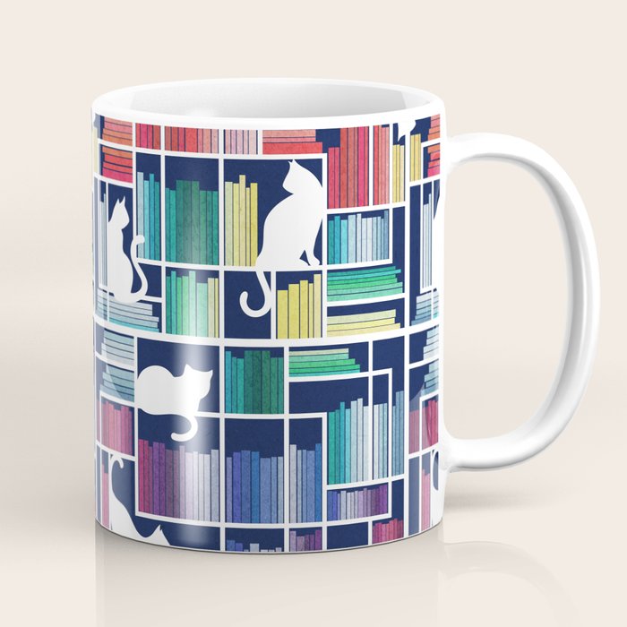 Rainbow bookshelf // navy blue background white shelf and library cats Coffee Mug Gallery Image 1
