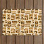 Vagabondâs Cupboard - gold, black, and cream  Outdoor Rug Gallery Image 1