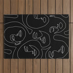 Faces in Dark Outdoor Rug Gallery Image 1
