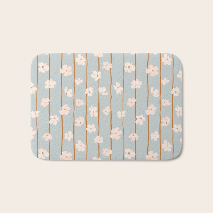 Peach flowers on green and orange vertical stripes background pattern Bath Mat Gallery Image 1