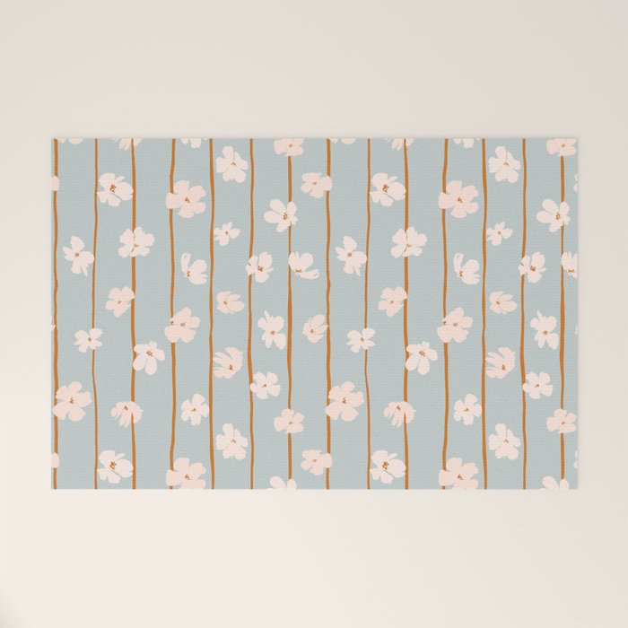 Peach flowers on green and orange vertical stripes background pattern Welcome Mat Gallery Image 1