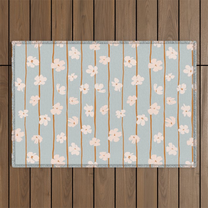 Peach flowers on green and orange vertical stripes background pattern Outdoor Rug Gallery Image 1