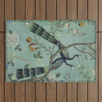 A Teal of Two Birds Chinoiserie Outdoor Rug Gallery Image 1
