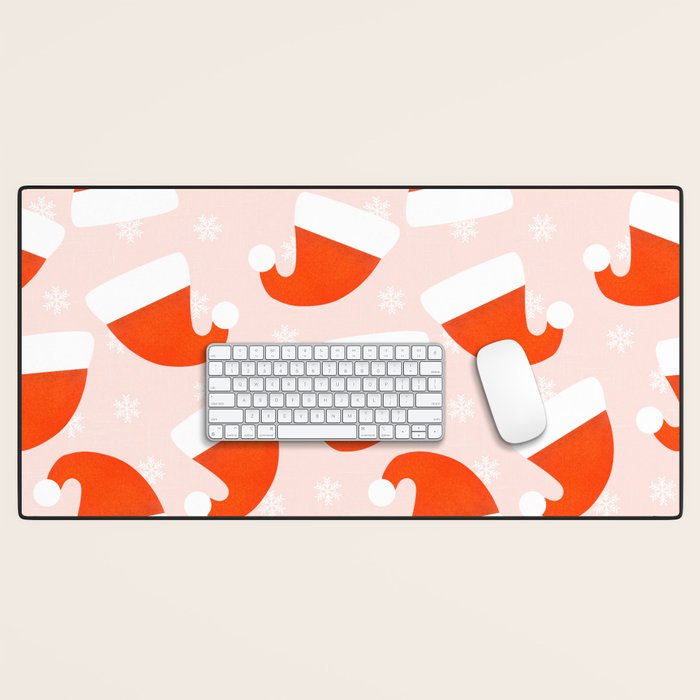 Santa Hats and Snowflakes on Pink Background Desk Mat Gallery Image 1