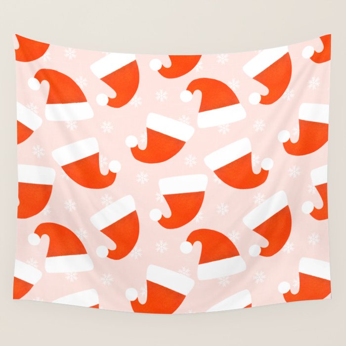 Santa Hats and Snowflakes on Pink Background Wall Tapestry Gallery Image 1