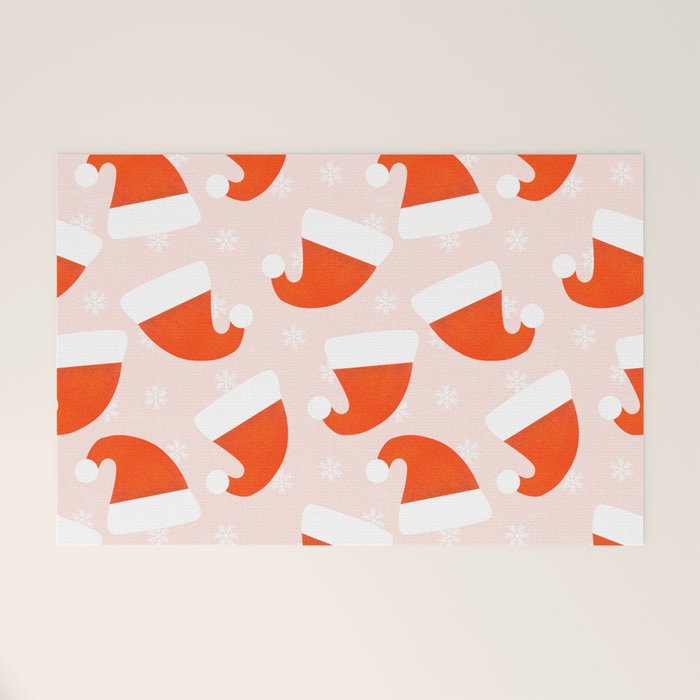 Santa Hats and Snowflakes on Pink Background Welcome Mat Gallery Image 1