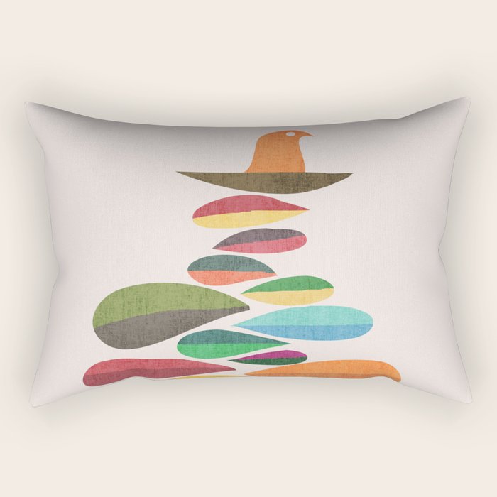 Bird nesting on top of pebbles hill Rectangular Pillow Gallery Image 1