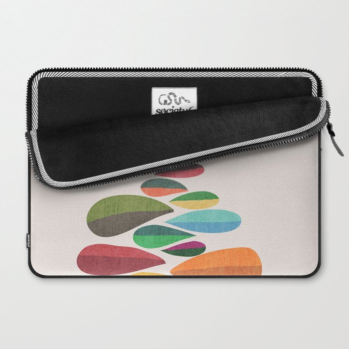 Bird nesting on top of pebbles hill Laptop Sleeve Gallery Image 2