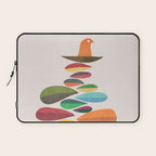 Bird nesting on top of pebbles hill Laptop Sleeve Gallery Image 1