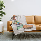 Bird nesting on top of pebbles hill Throw Blanket Gallery Image 1
