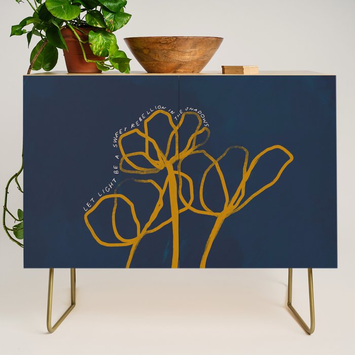 "Let Light Be A Sweet Rebellion In The Shadows." Credenza Gallery Image 1