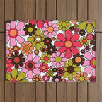 Retro Garden Flowers Groovy 60s 70s Floral Pattern in Pink, Dark Brown, Avocado Green, Orange, and Black Outdoor Rug Gallery Image 1