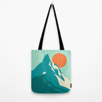 As the sun rises over the peak Tote Bag Gallery Image 2