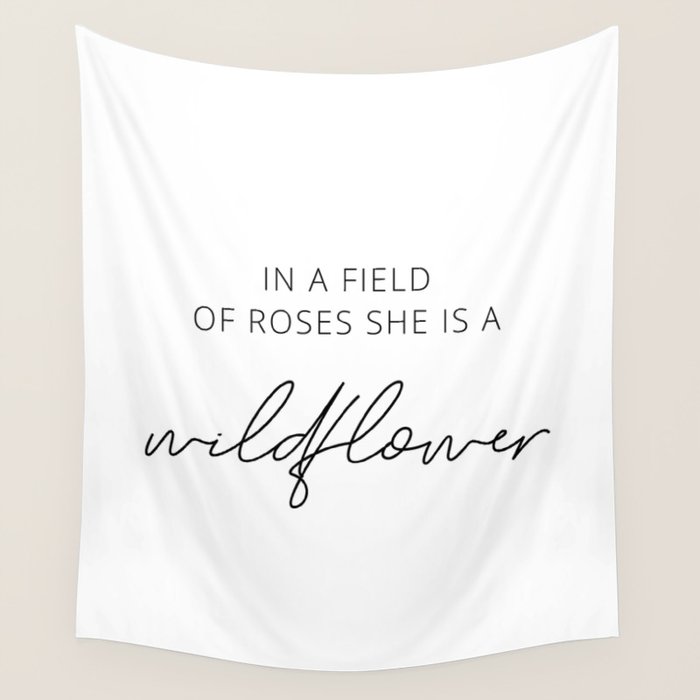 In a field of roses she is a wildflower Wall Tapestry Gallery Image 1