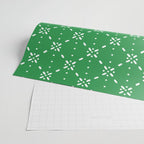 Christmas snowflake vector with simple modern white stitches on green background pattern Wrapping Paper Gallery Image 2