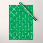 Christmas snowflake vector with simple modern white stitches on green background pattern Wrapping Paper Gallery Image 1