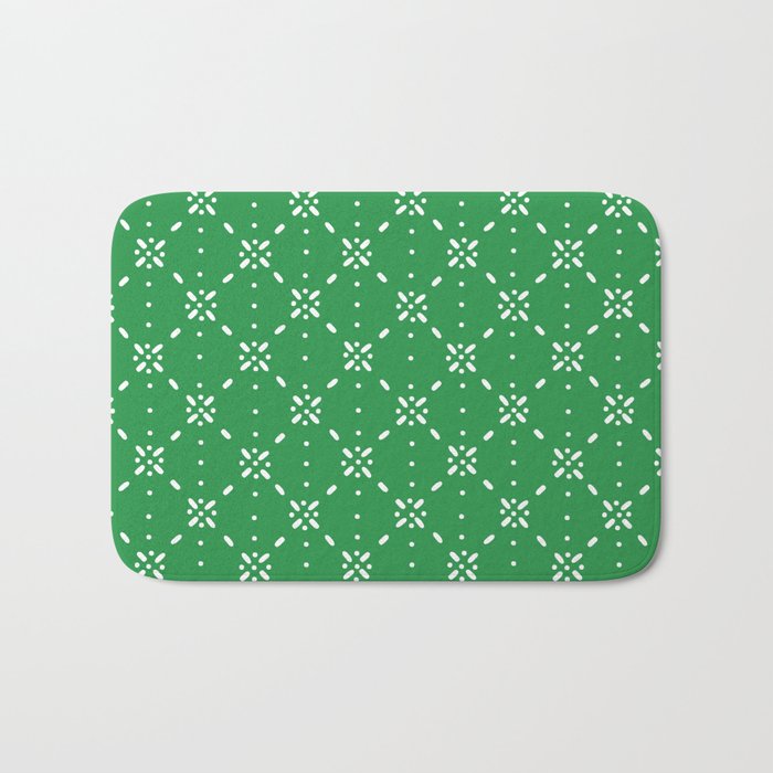 Christmas snowflake vector with simple modern white stitches on green background pattern Bath Mat Gallery Image 1
