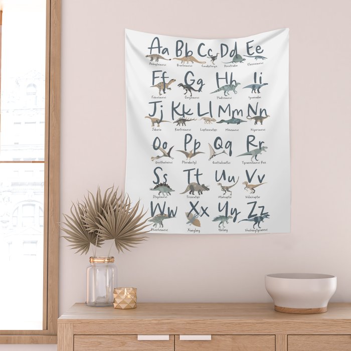 Dinosaur alphabet in muted shades of blue, grey and green Wall Tapestry Gallery Image 2