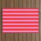 Preppy Pink and Red Stripes Pattern Outdoor Rug Gallery Image 1