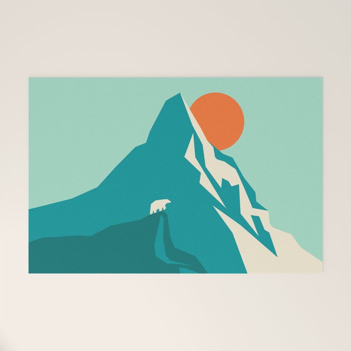 As the sun rises over the peak Welcome Mat Gallery Image 1
