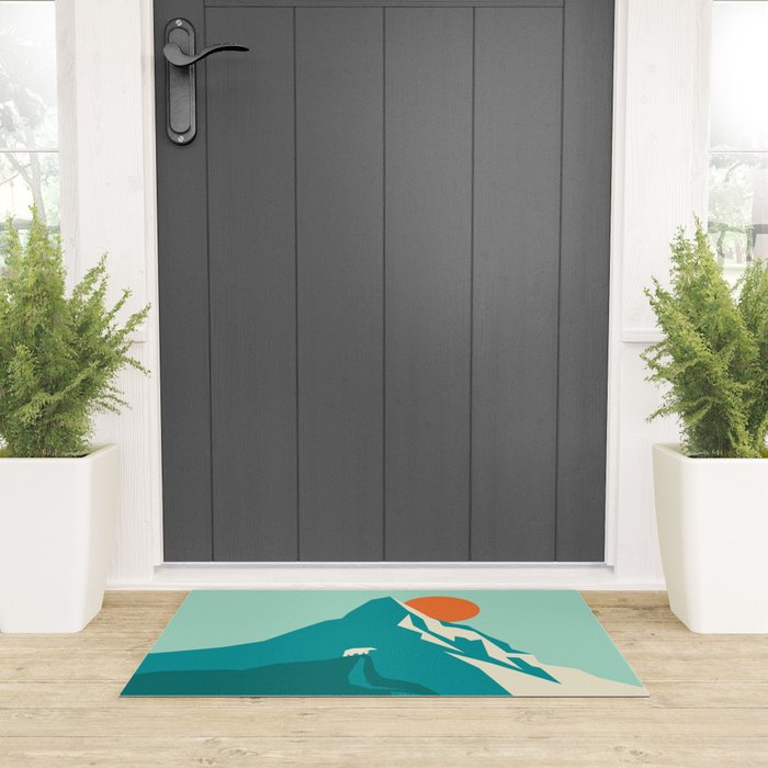 As the sun rises over the peak Welcome Mat Gallery Image 3