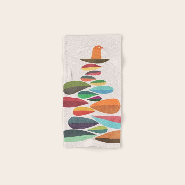 Bird nesting on top of pebbles hill Bath Towel Gallery Image 1