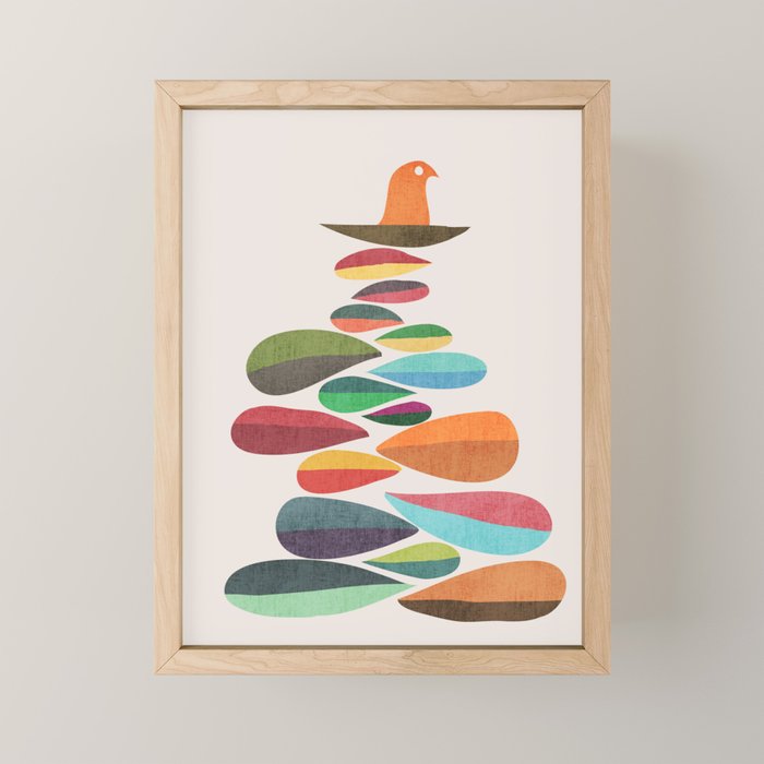 Bird nesting on top of pebbles hill Mini Art Print Gallery Image 1