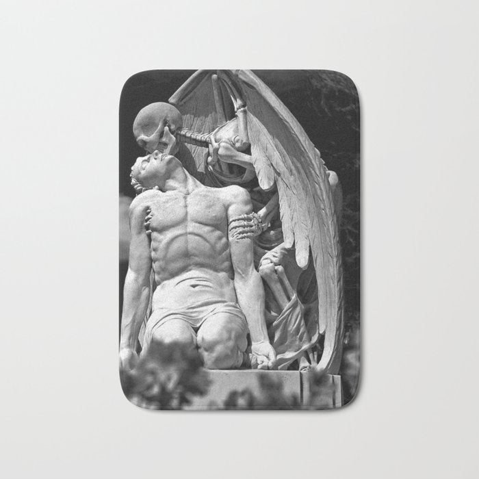 Kiss of Death, grave headstone winged angel of death marble sculpture and man Barcelona, Spain  Bath Mat Gallery Image 1