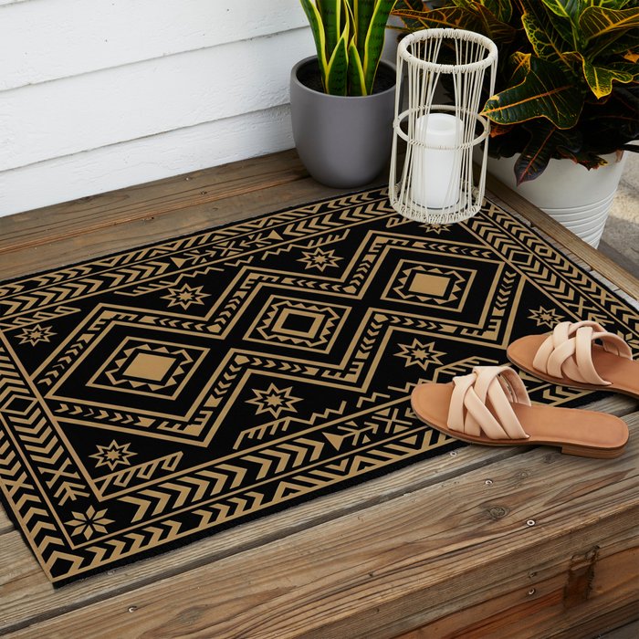 Intricate Gold and Black Tribal Surface Pattern Outdoor Rug Gallery Image 2