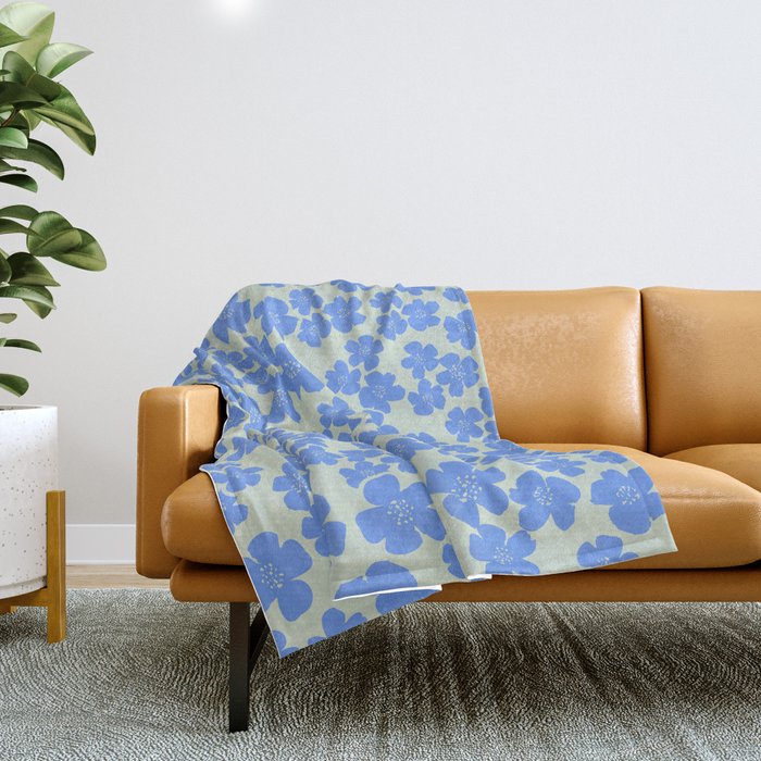 Blue flower blossom scatter on soft green Throw Blanket Gallery Image 1