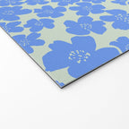 Blue flower blossom scatter on soft green Welcome Mat Gallery Image 2