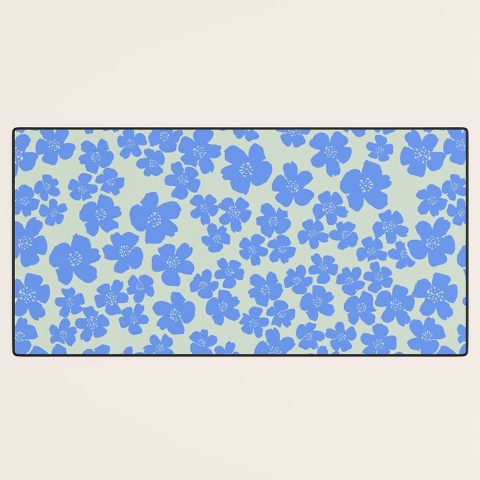 Blue flower blossom scatter on soft green Desk Mat Gallery Image 3