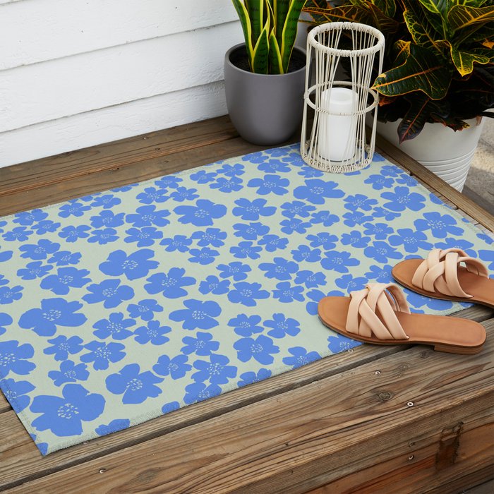 Blue flower blossom scatter on soft green Outdoor Rug Gallery Image 2