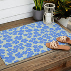 Blue flower blossom scatter on soft green Outdoor Rug Gallery Image 2