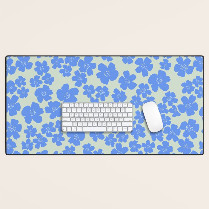 Blue flower blossom scatter on soft green Desk Mat Gallery Image 1
