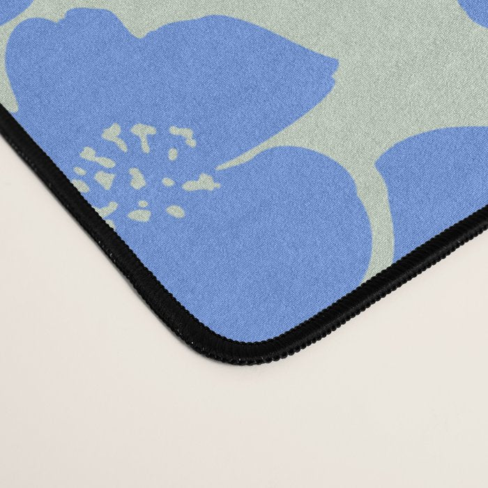 Blue flower blossom scatter on soft green Desk Mat Gallery Image 4