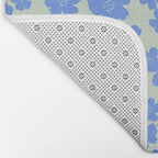 Blue flower blossom scatter on soft green Bath Mat Gallery Image 2