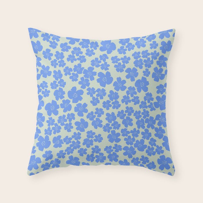 Blue flower blossom scatter on soft green Throw Pillow Gallery Image 1