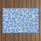 Blue flower blossom scatter on soft green Outdoor Rug Gallery Image 1