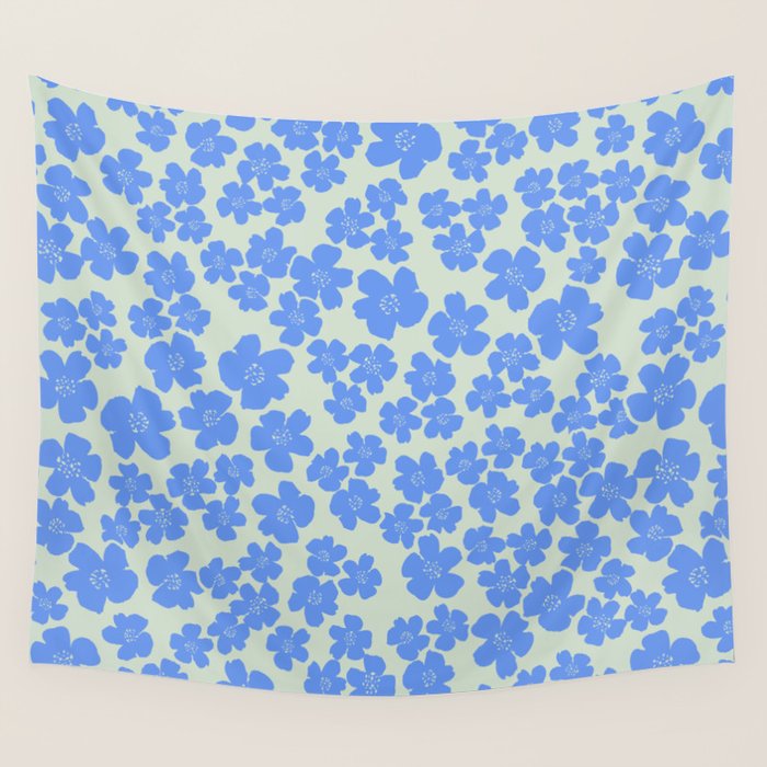 Blue flower blossom scatter on soft green Wall Tapestry Gallery Image 4