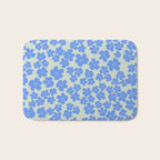 Blue flower blossom scatter on soft green Bath Mat Gallery Image 1