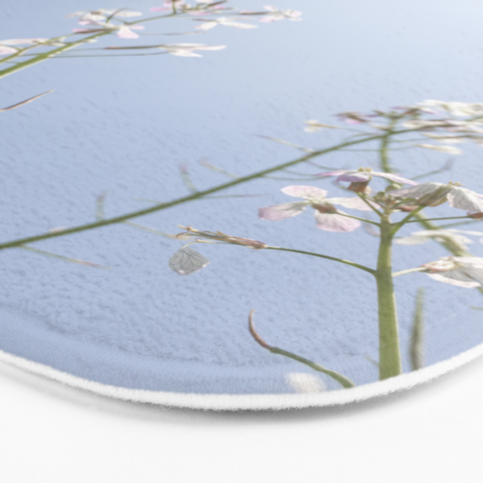 Wild radish flowers in a meadow in the spring against a clear blue sky - nature photography Bath Mat Gallery Image 3