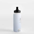Wild radish flowers in a meadow in the spring against a clear blue sky - nature photography Water Bottle Gallery Image 2