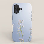 Wild radish flowers in a meadow in the spring against a clear blue sky - nature photography iPhone Case Gallery Image 1