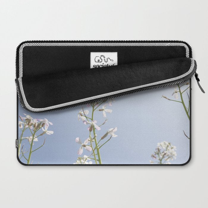 Wild radish flowers in a meadow in the spring against a clear blue sky - nature photography Laptop Sleeve Gallery Image 2